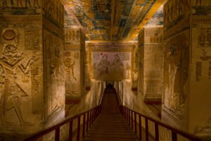 Carved underground corridor with hieroglyphics inside Valley of the Kings tomb